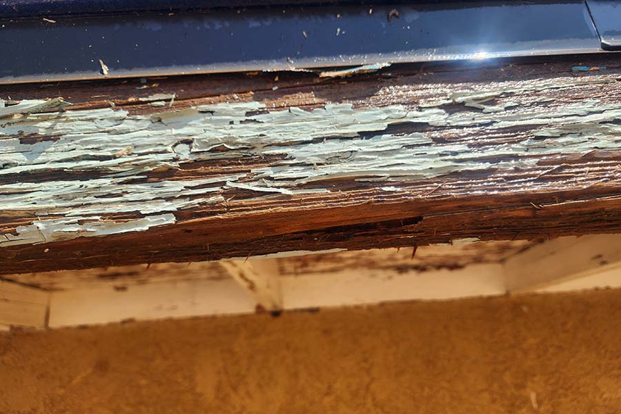 Damage to wood paint, repainting